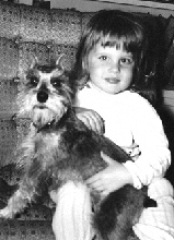 Young Deborah Heiligman with dog